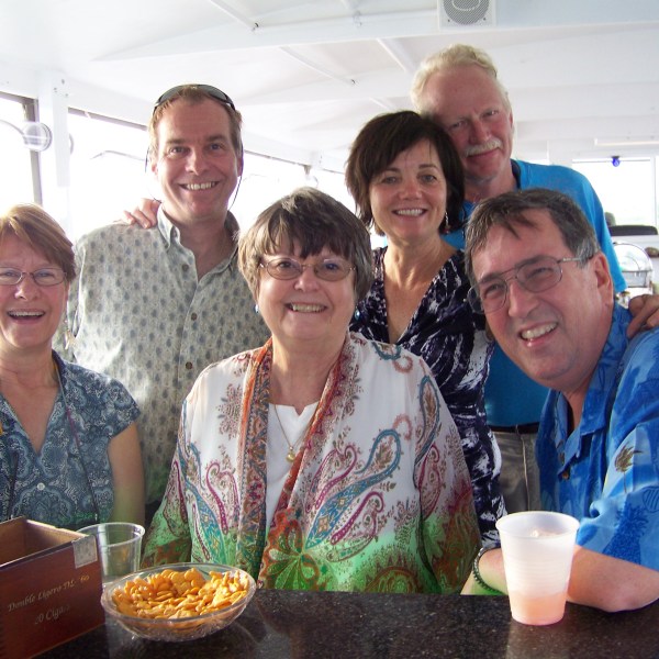 a group of people posing for the camera