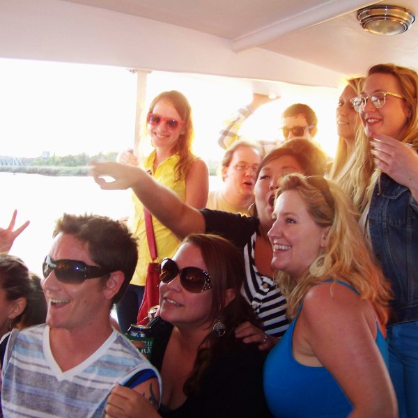 a group of people posing for the camera