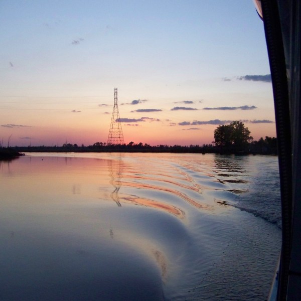 a sunset over a body of water