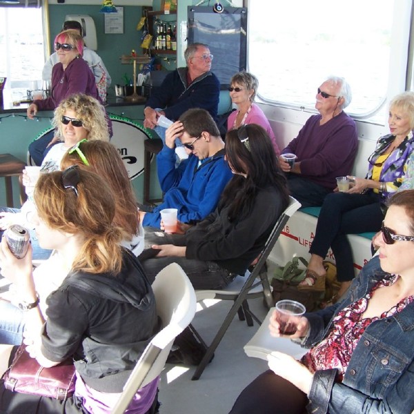 a group of people sitting in front of a crowd