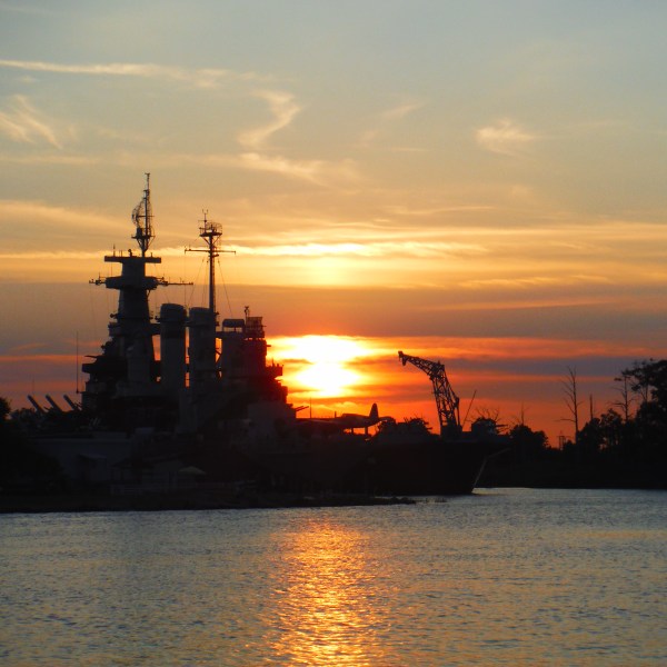 a sunset over a body of water