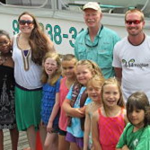 a group of people posing for the camera