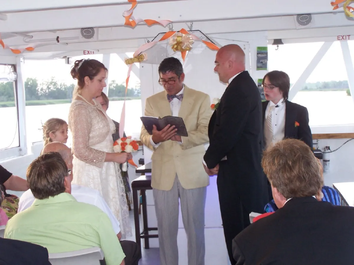 a group of people standing in a room