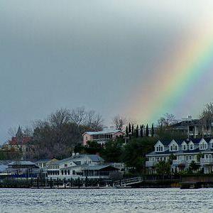 a rainbow over a body of water