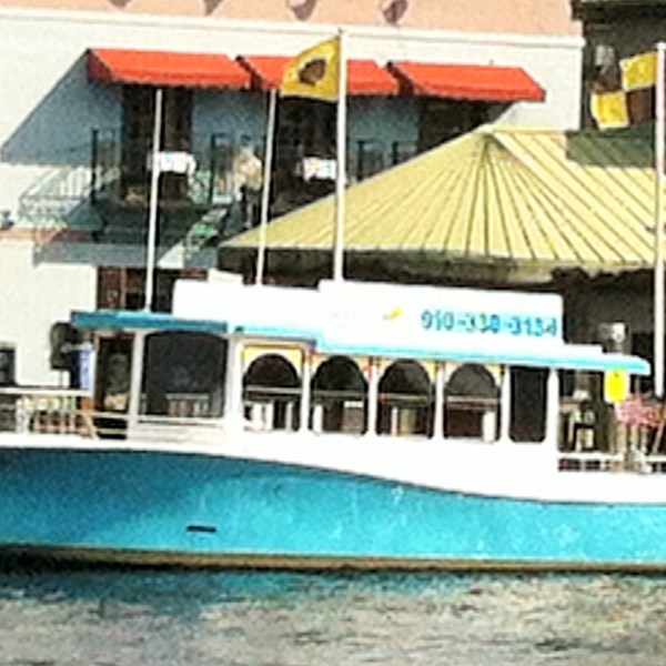 a boat parked on the side of a building