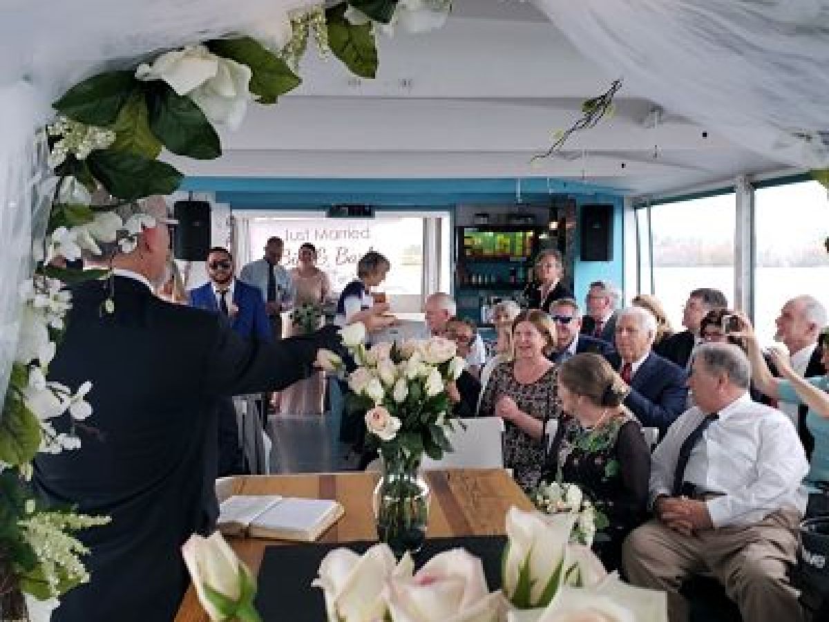 a group of people standing in a room