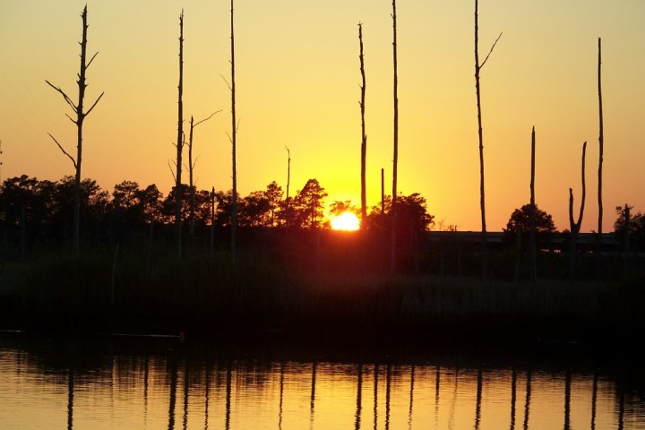 a sunset over a body of water