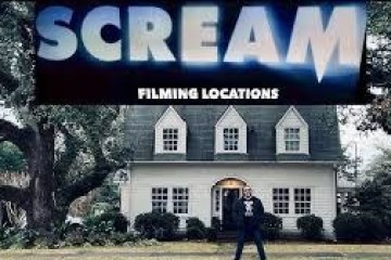 a sign in front of a house